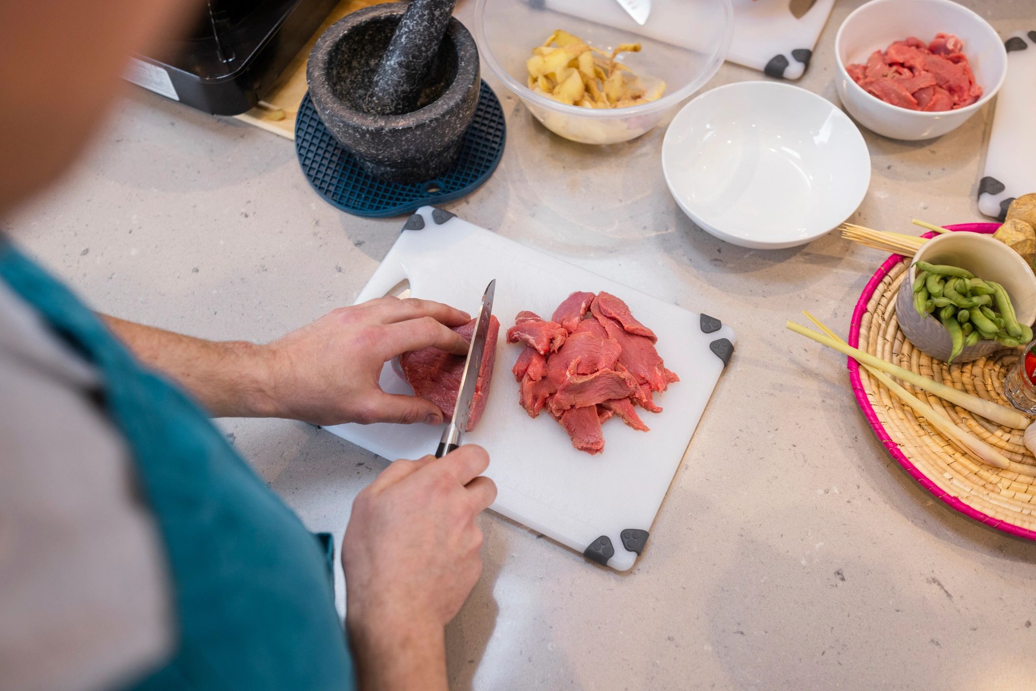 Chef preparing premium beef in a fine dining kitchen