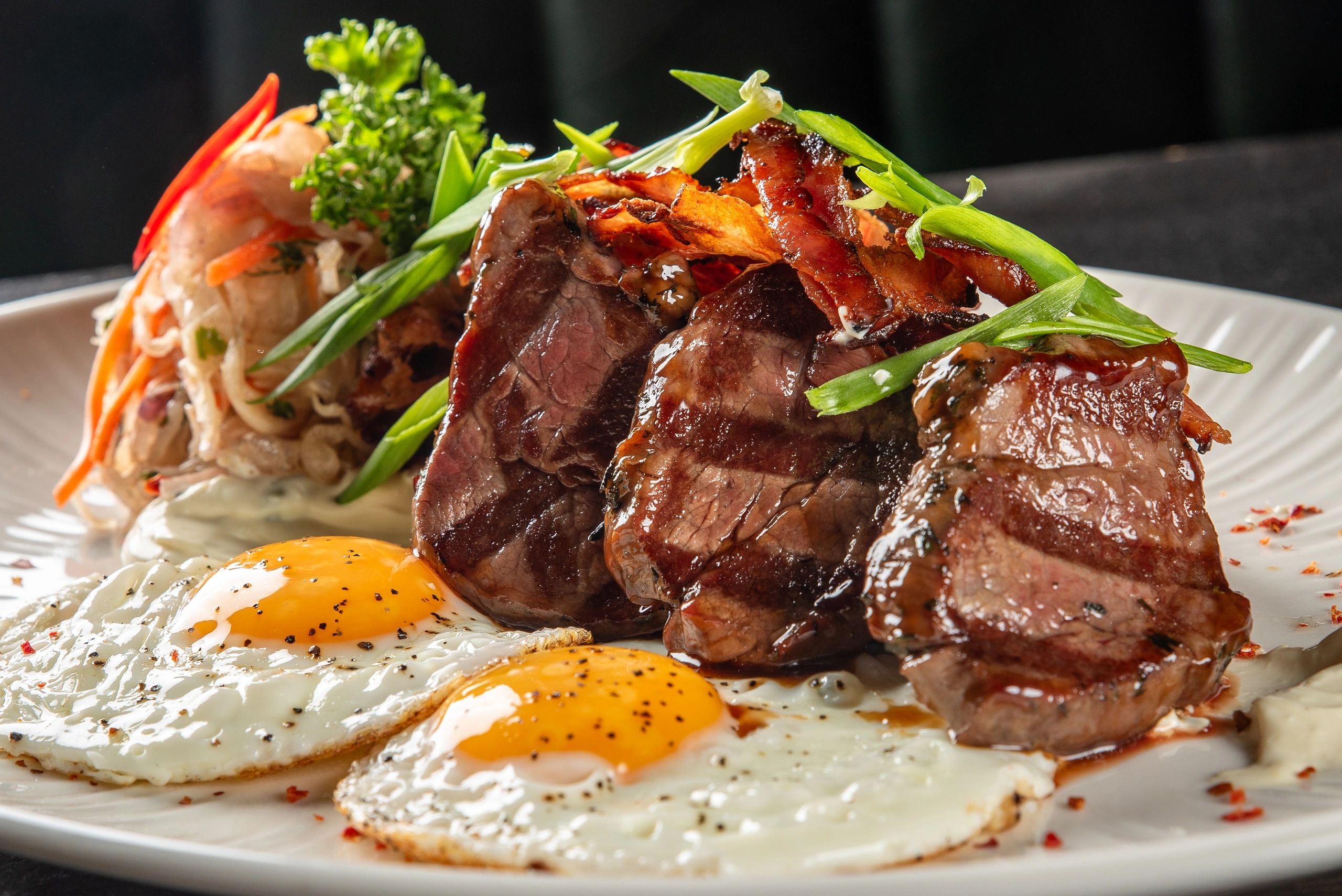 Steak plate with sides presented for brunch service